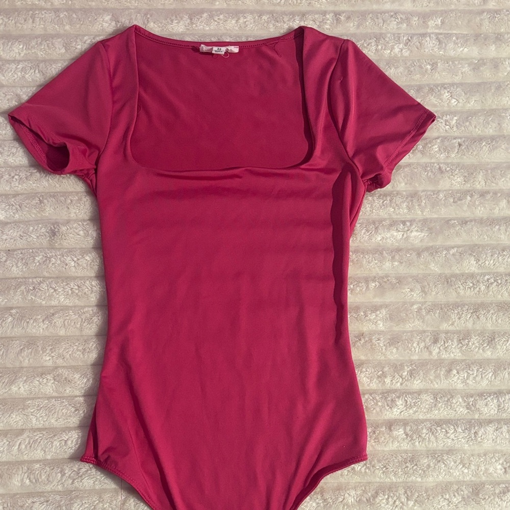 Pink short sleeve bodysuit